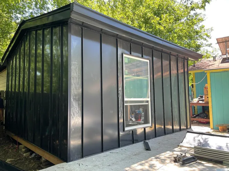 Black standing seam metal wall panels for Metal Roof Installation in Osage Beach