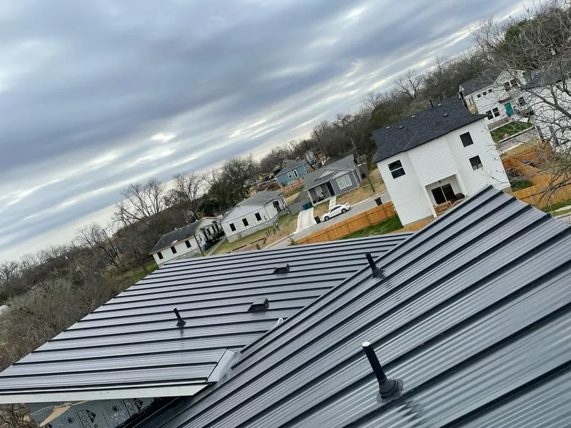 Standing seam metal roof panels with vents for Skylight Repair in Osage Beach